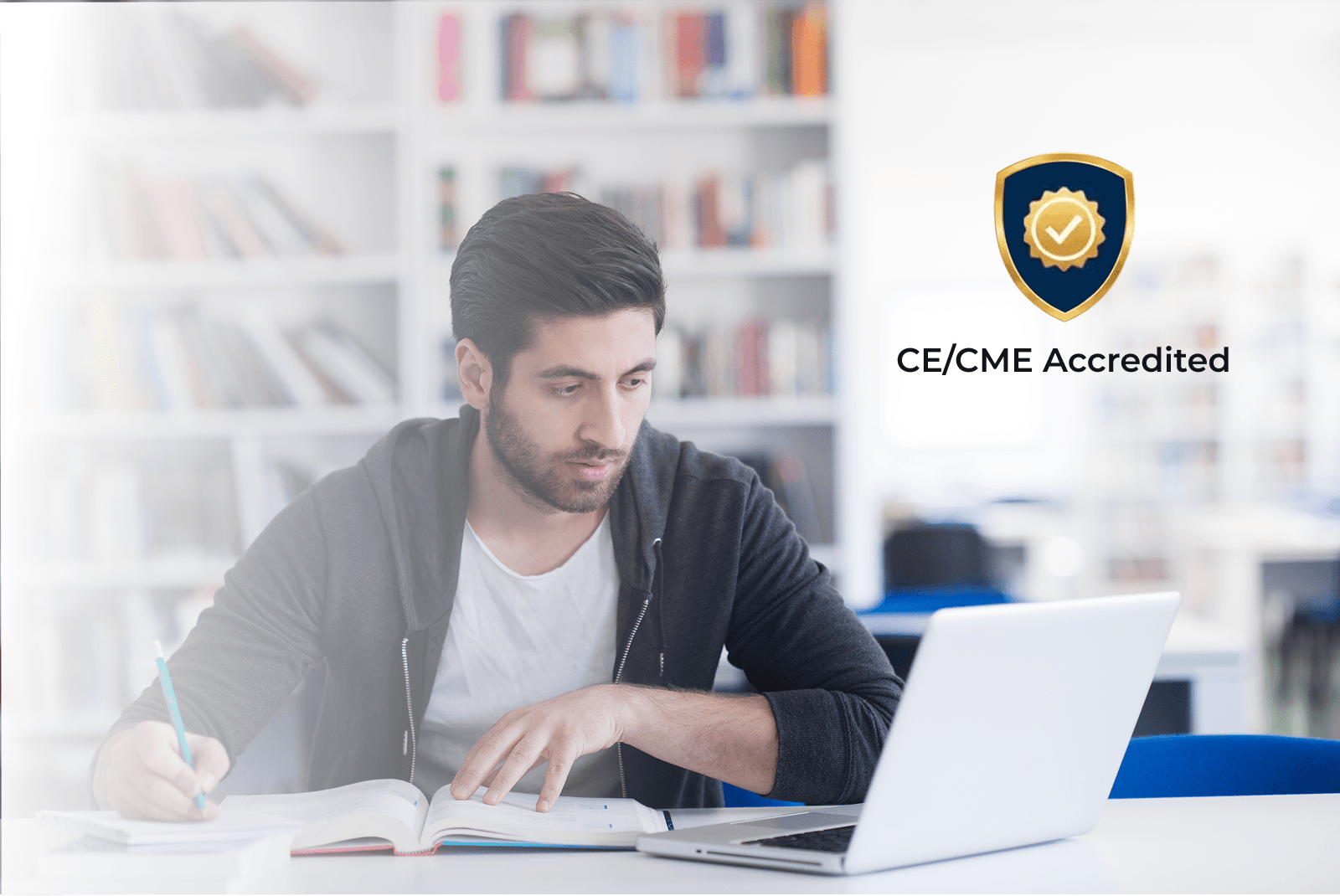 Man at a computer with a CE Badge