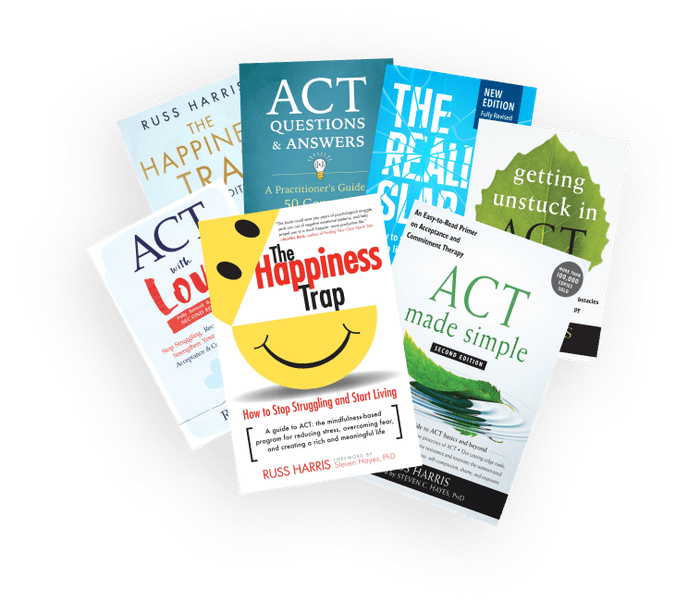 A spread of books by Russ Harris.