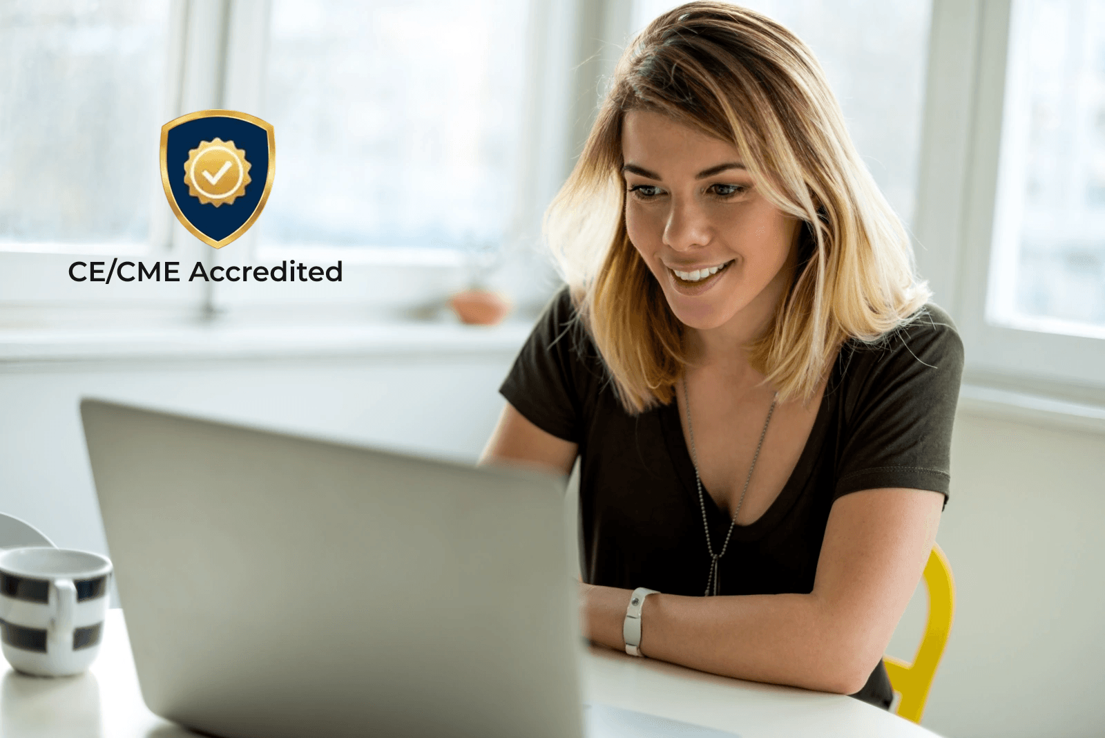 Woman at computer with CE Accreditation badge
